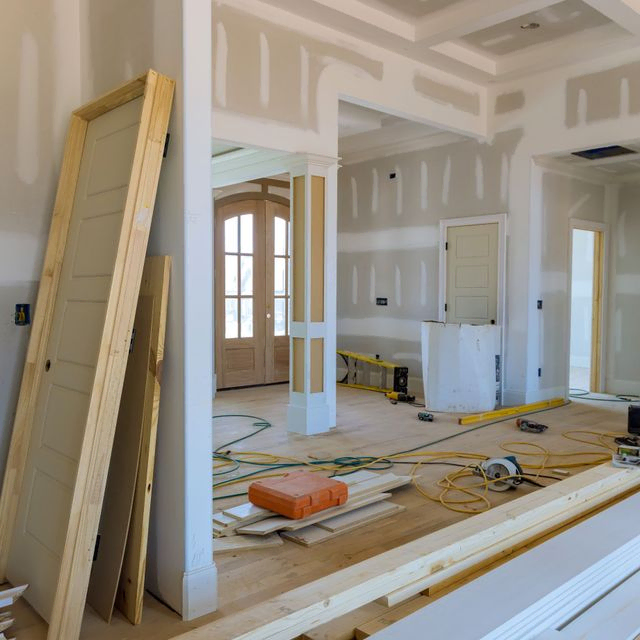 new-house-construction-with-stacker-wooden-material-door-molding-trim